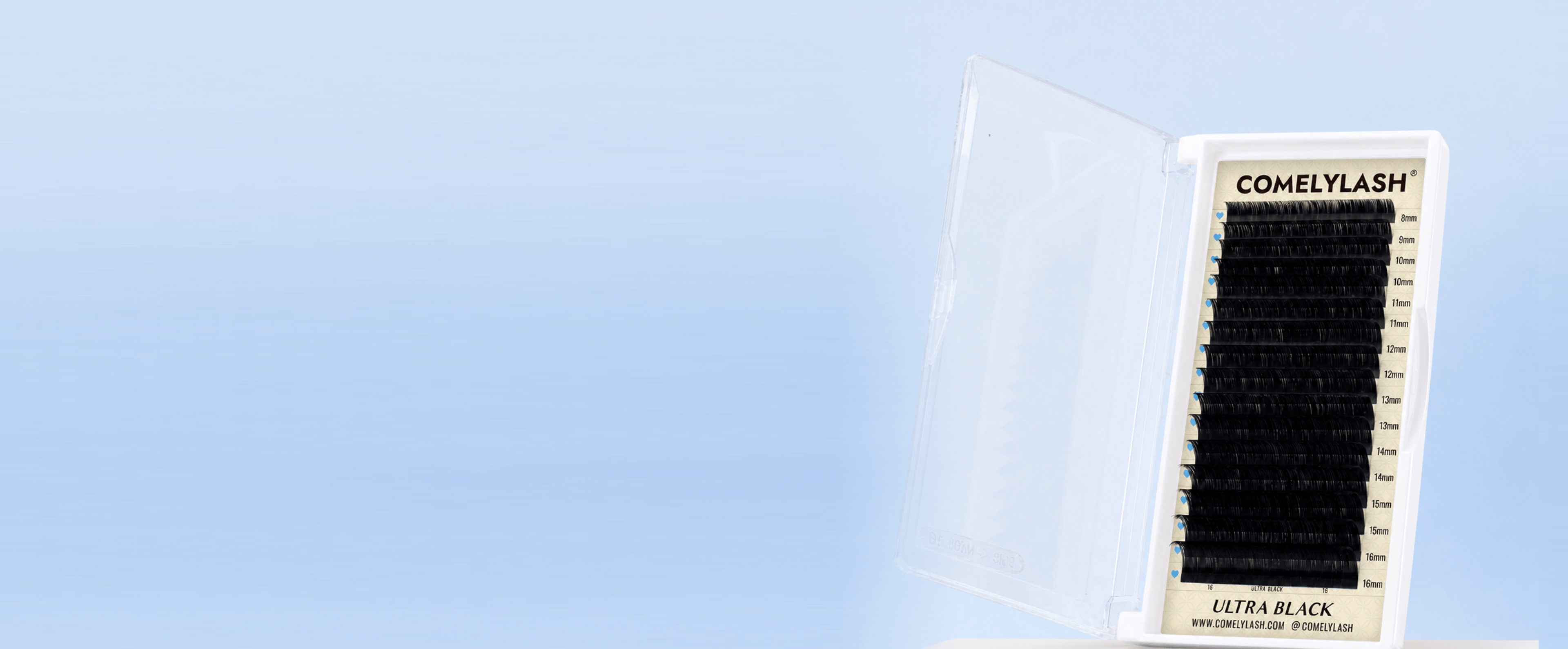 COMELYLASH Ultra Black open lash tray on a pale blue desktop hero background